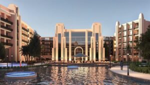 Alt Text: "Luxury Atlantis project facade in Hurghada with water features and outdoor seating areas at sunset